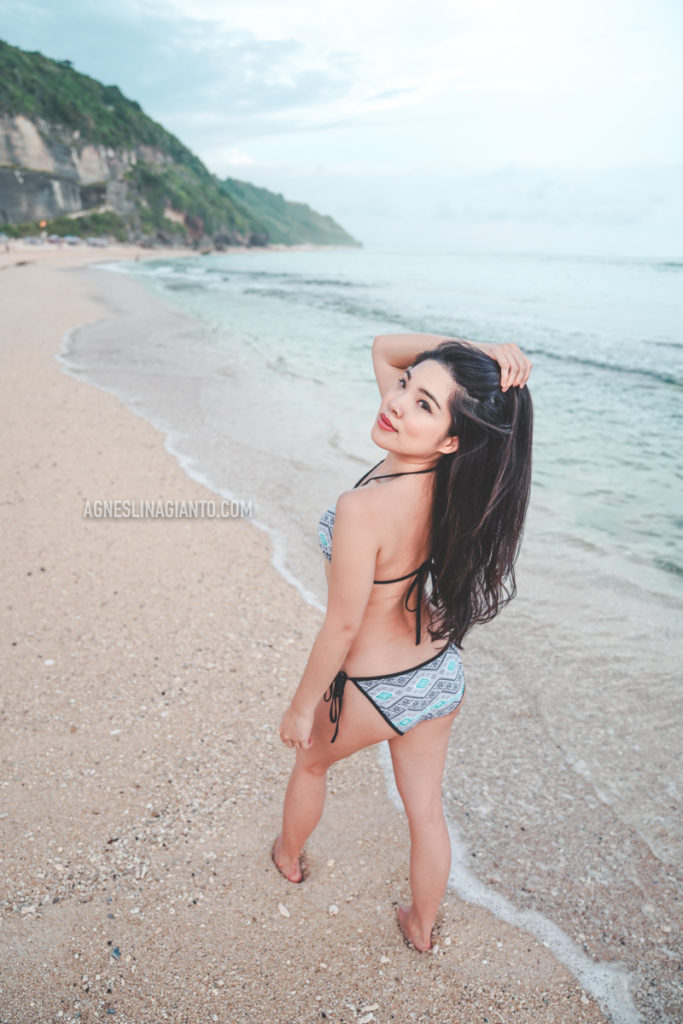 A girl in bikini at Pandawa Beach Bali at Roosterfish Beach Club