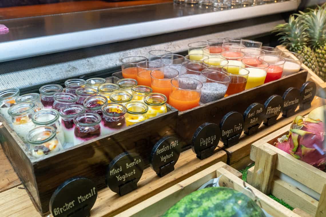 Breakfast buffet: bircher muesli. berry and passion fruit yoghurt and various fresh juices